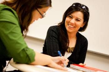 Girl smiling at friend 